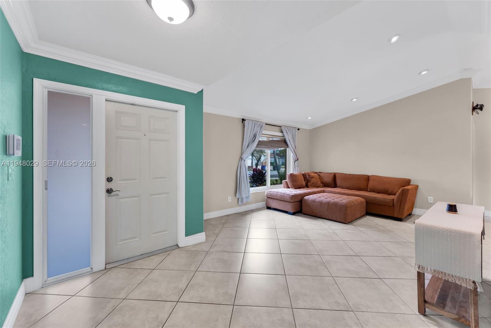 11628 Southwest 50th Street Cooper City, FL 33330 - Photo 5 of 22 a bedroom with a bed and window