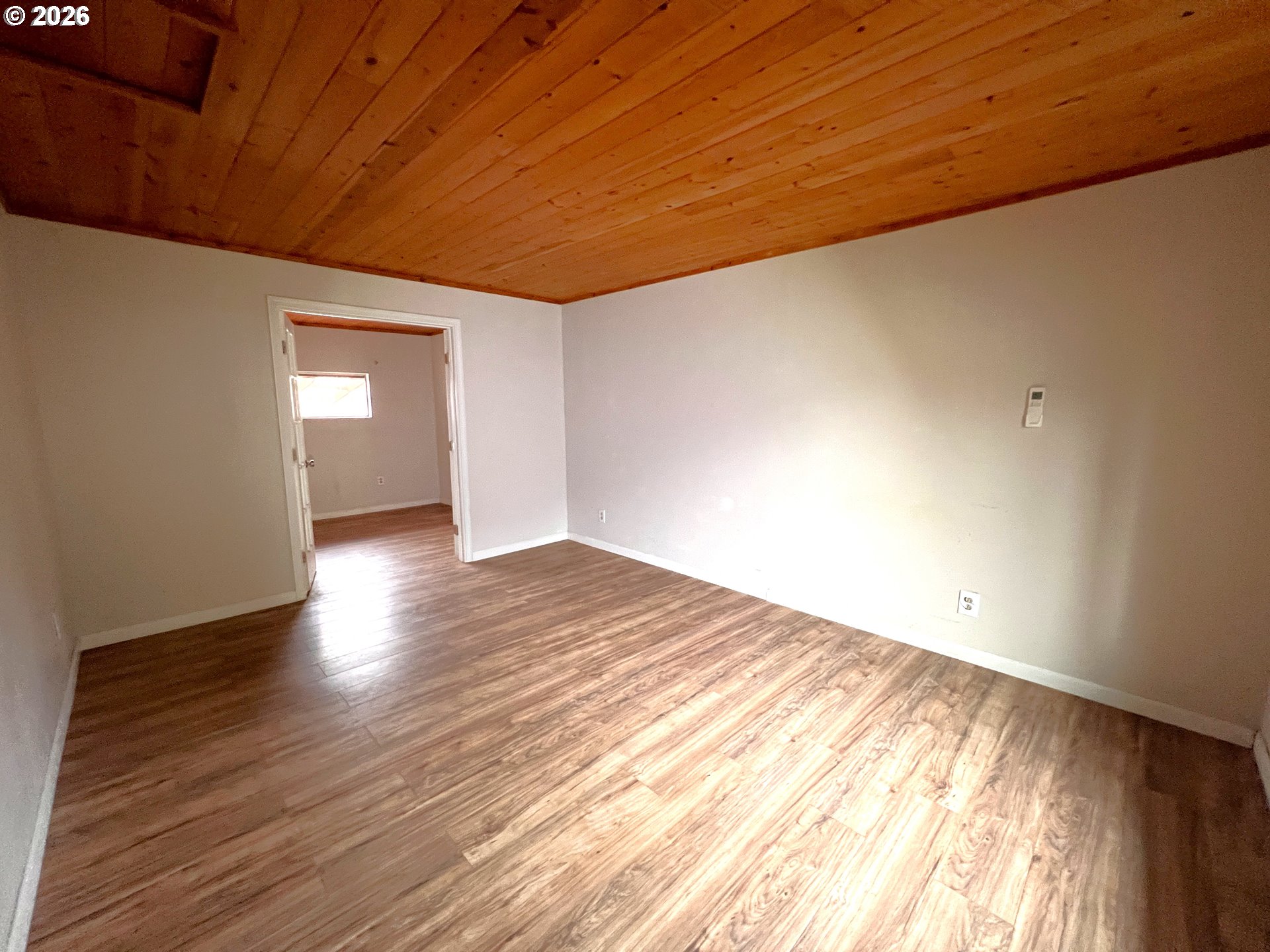 94191 10th Street Gold Beach, OR 97444 - Photo 11 of 33 a view of empty room with wooden floor