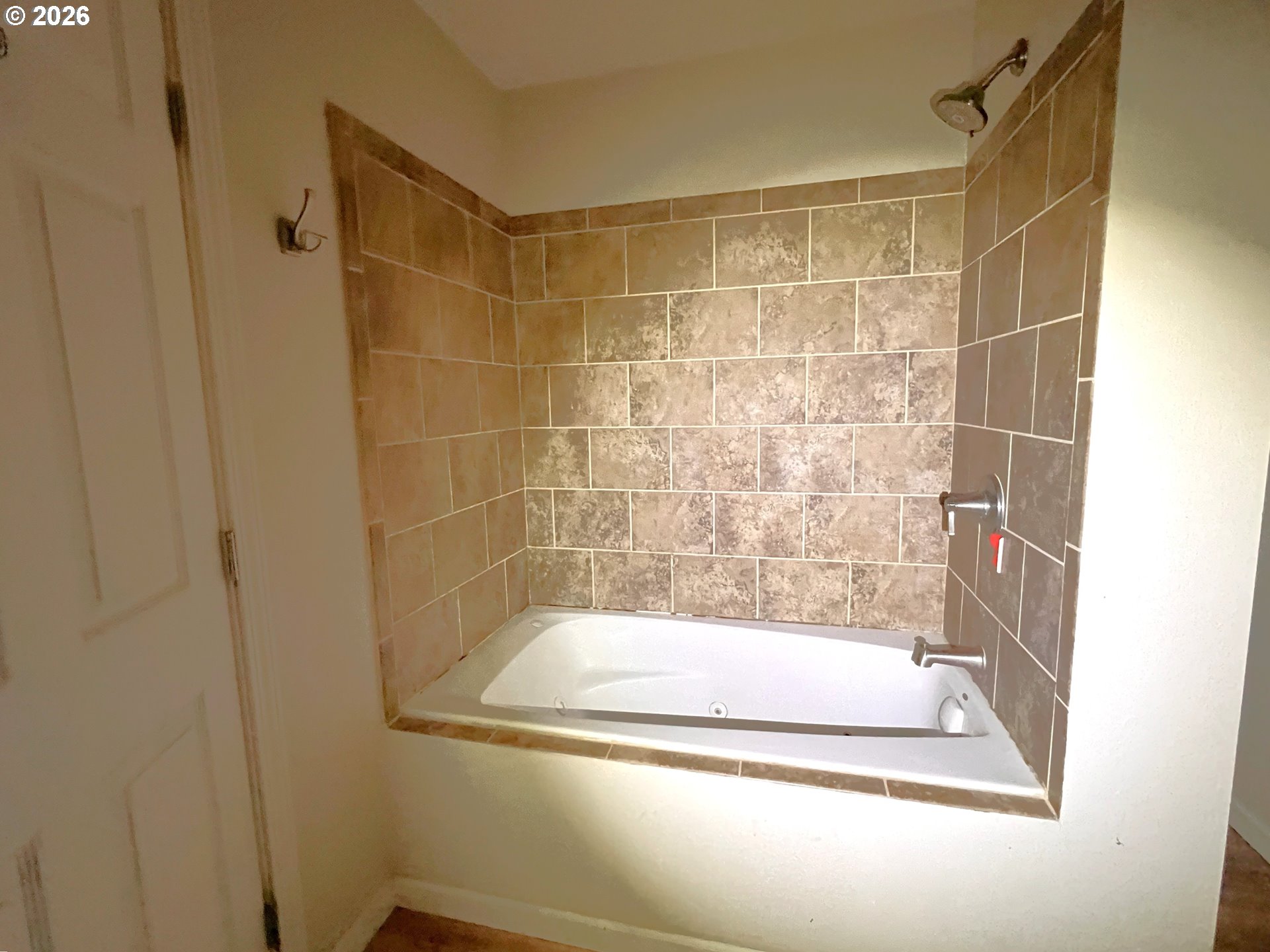 94191 10th Street Gold Beach, OR 97444 - Photo 12 of 33 a bathroom with a bath tub