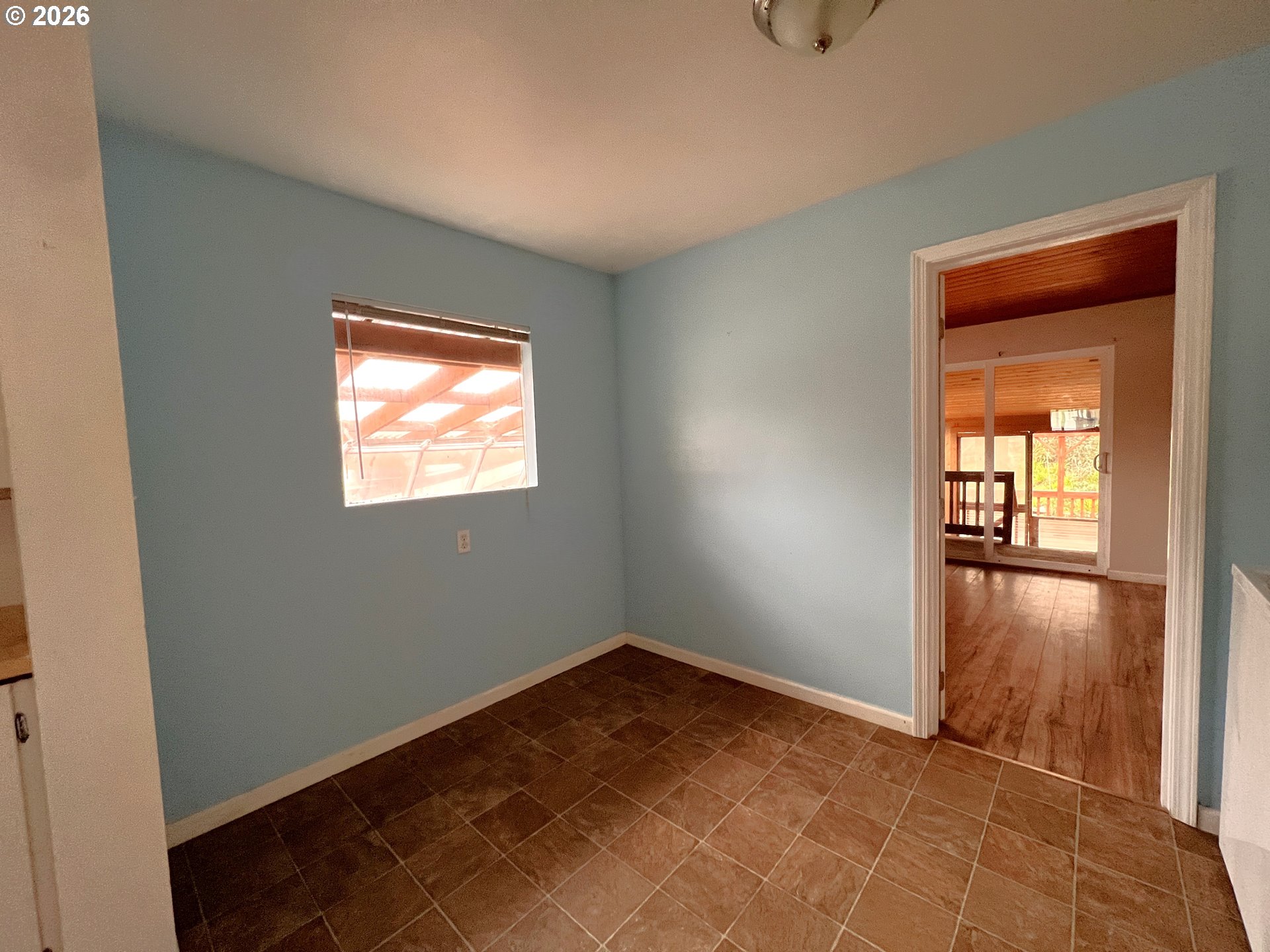 94191 10th Street Gold Beach, OR 97444 - Photo 15 of 33 an empty room with windows and closet