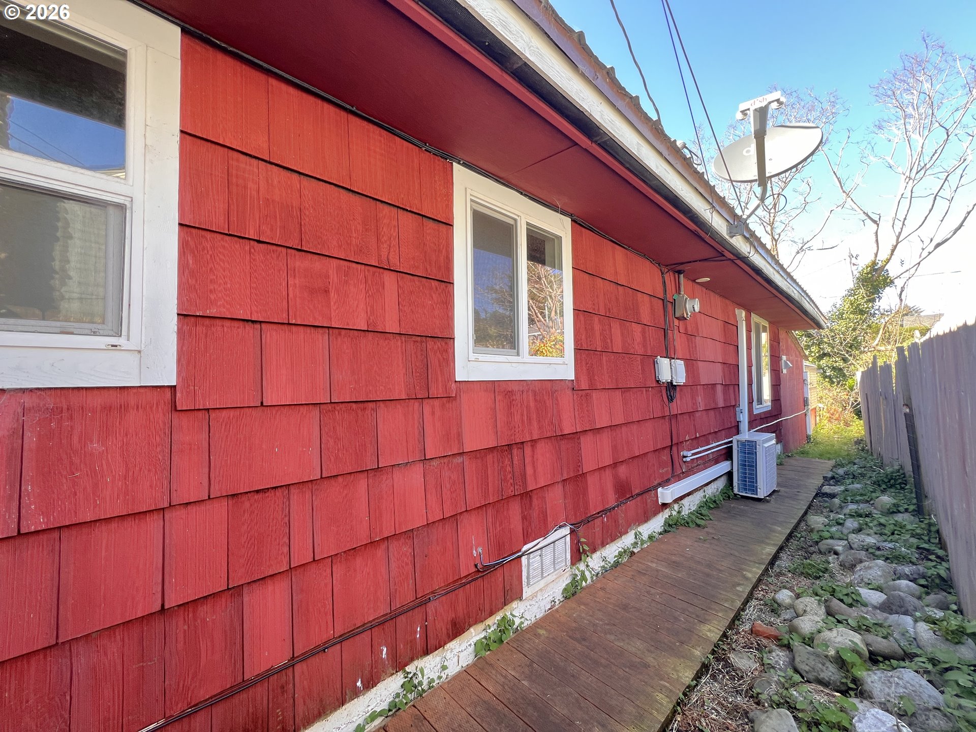 94191 10th Street Gold Beach, OR 97444 - Photo 26 of 33 a view of a house with a street