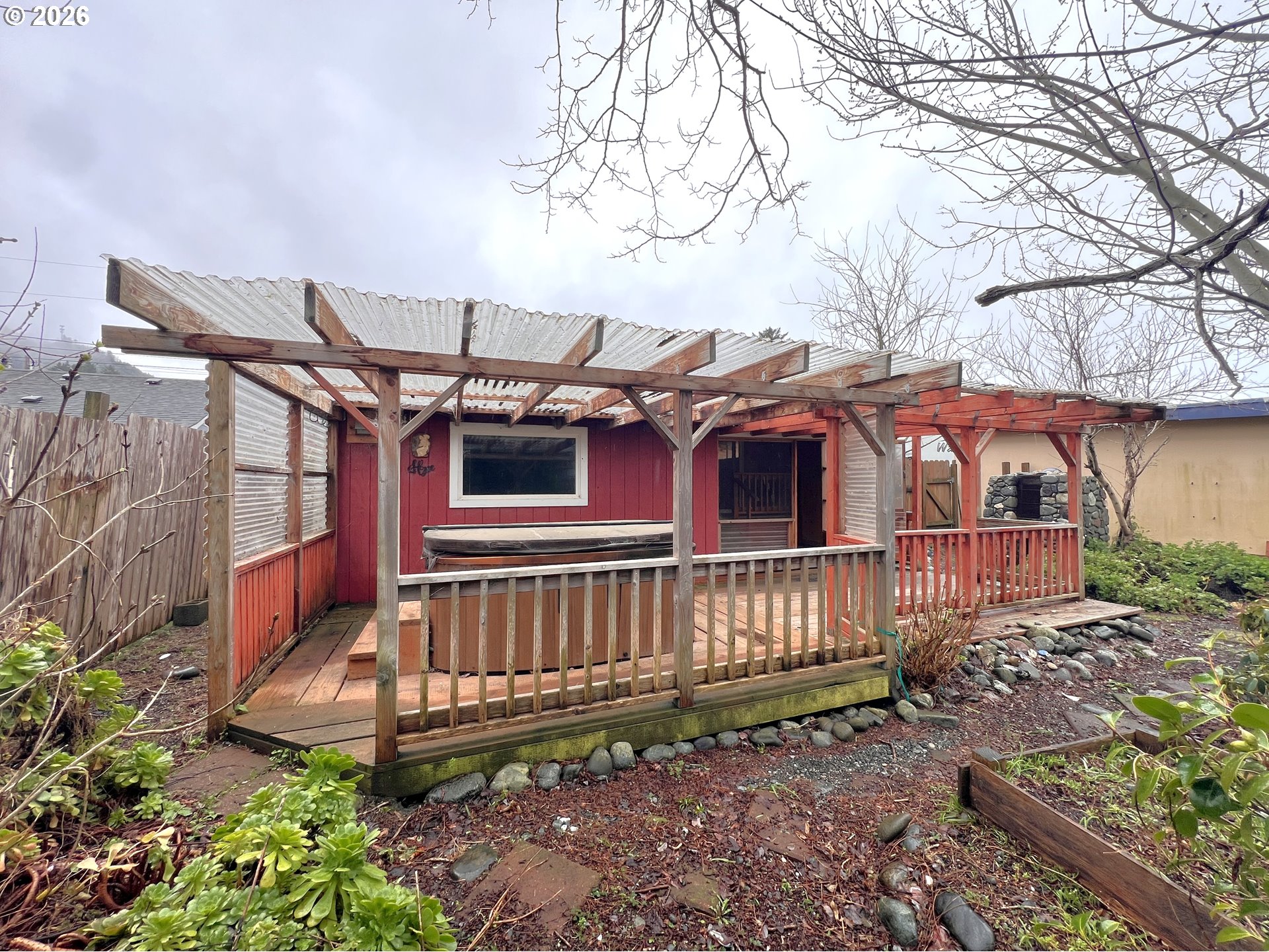 94191 10th Street Gold Beach, OR 97444 - Photo 3 of 33 a view of a house with a yard