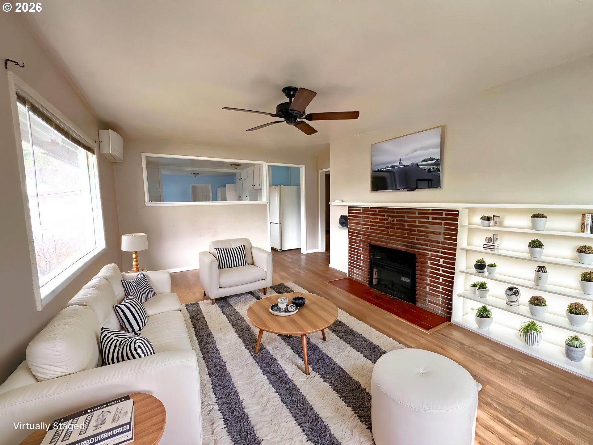 94191 10th Street Gold Beach, OR 97444 - Photo 31 of 33 a living room with furniture fireplace and window