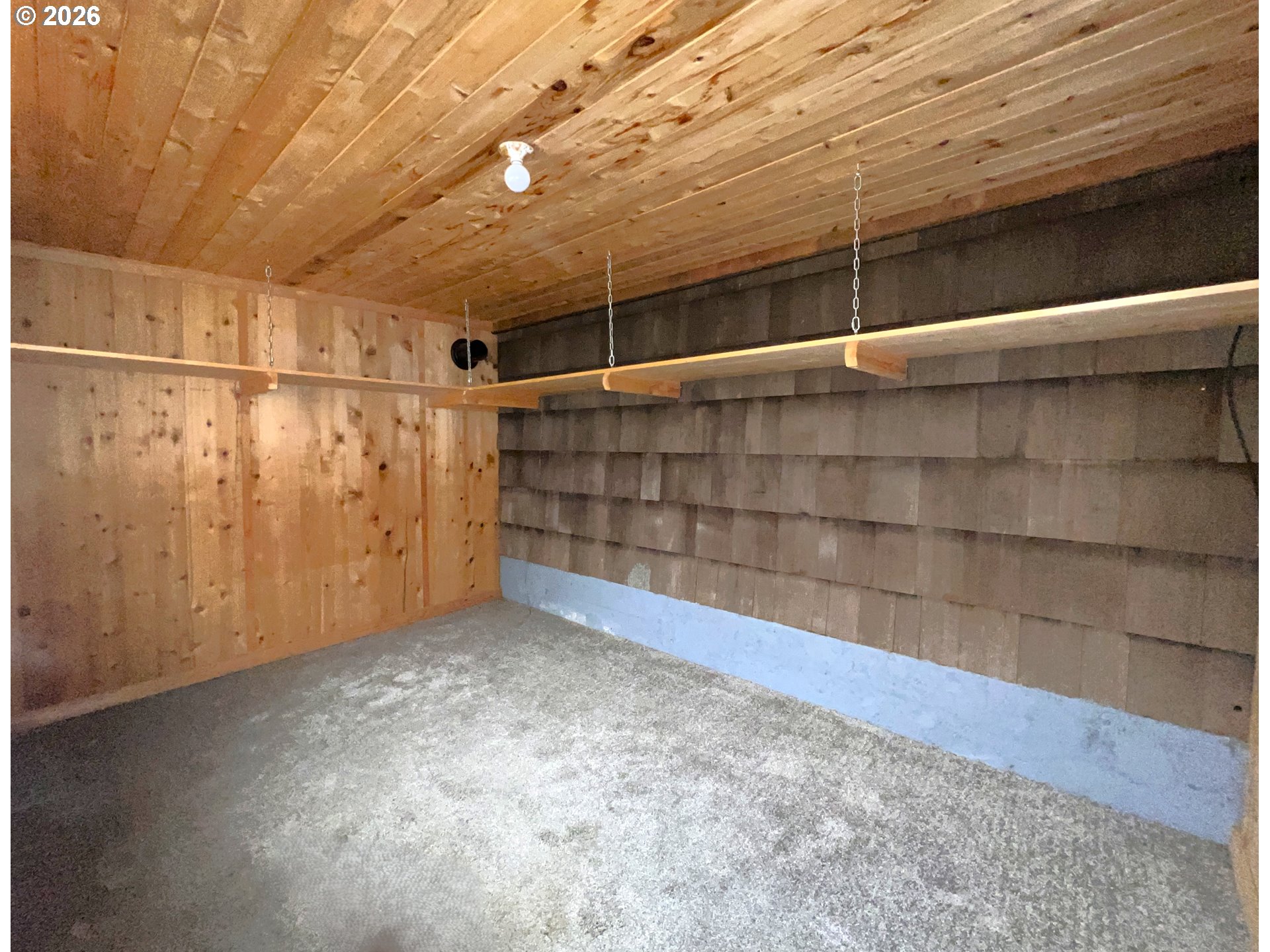 94191 10th Street Gold Beach, OR 97444 - Photo 6 of 33 a view of a room with racks on the wall