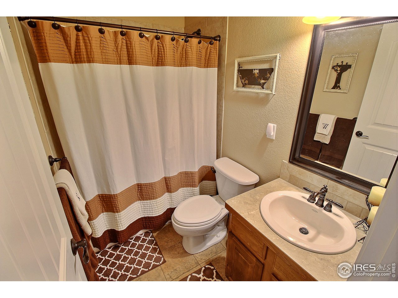6721 West 34th St Road Greeley, CO 80634 - Photo 23 of 40 Main Floor Shared Bathroom