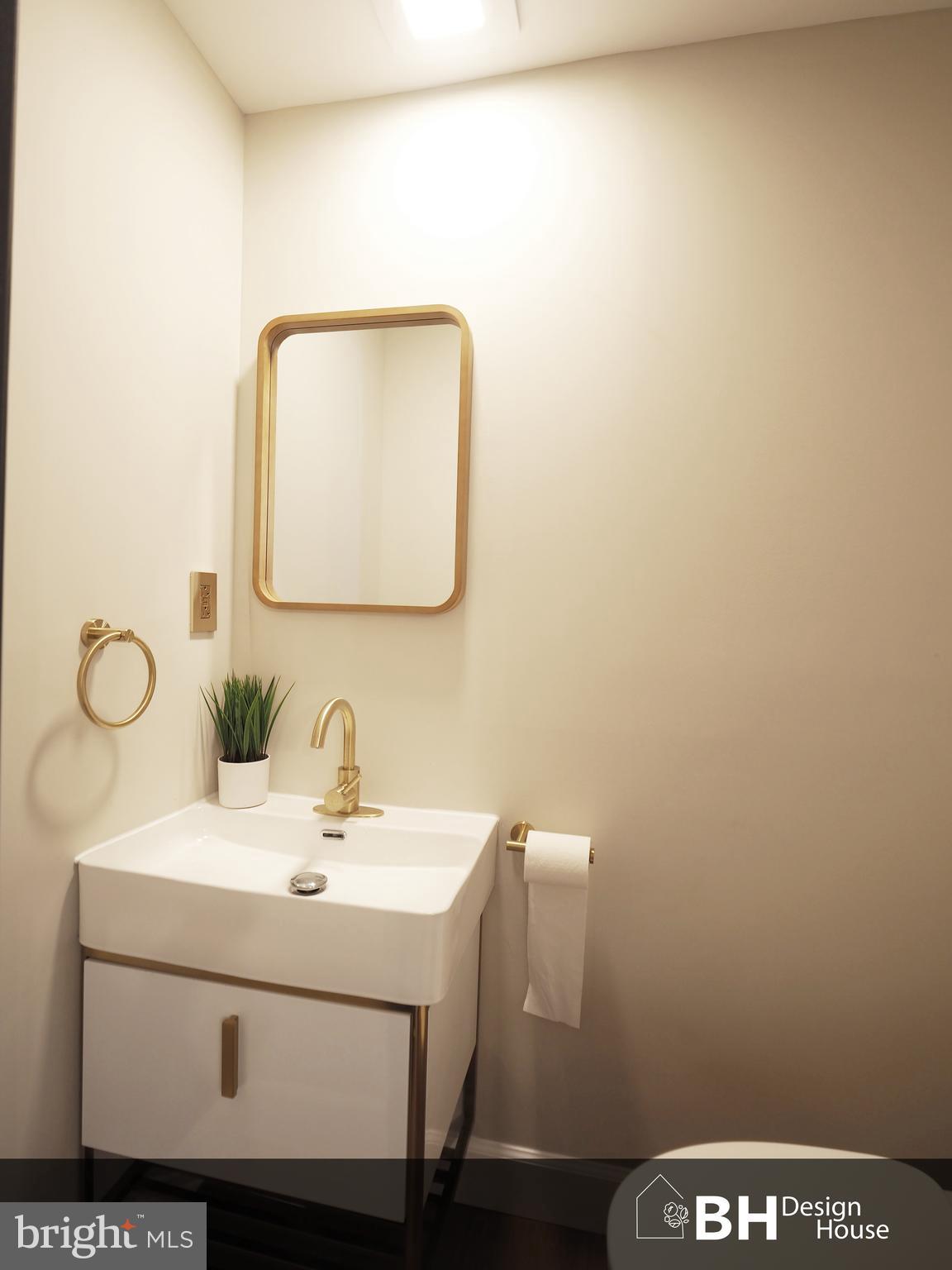 449 Anglesea Street Baltimore, MD 21224 - Photo 18 of 46 first floor powder room