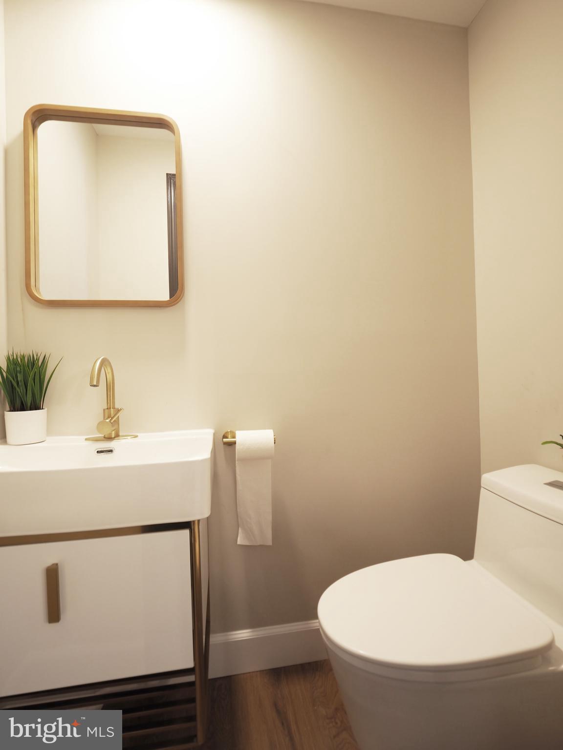 449 Anglesea Street Baltimore, MD 21224 - Photo 19 of 46 first floor powder room