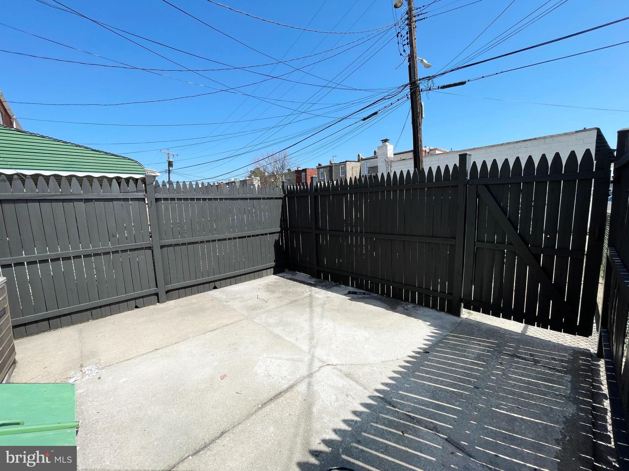449 Anglesea Street Baltimore, MD 21224 - Photo 36 of 46 fenced backyard
