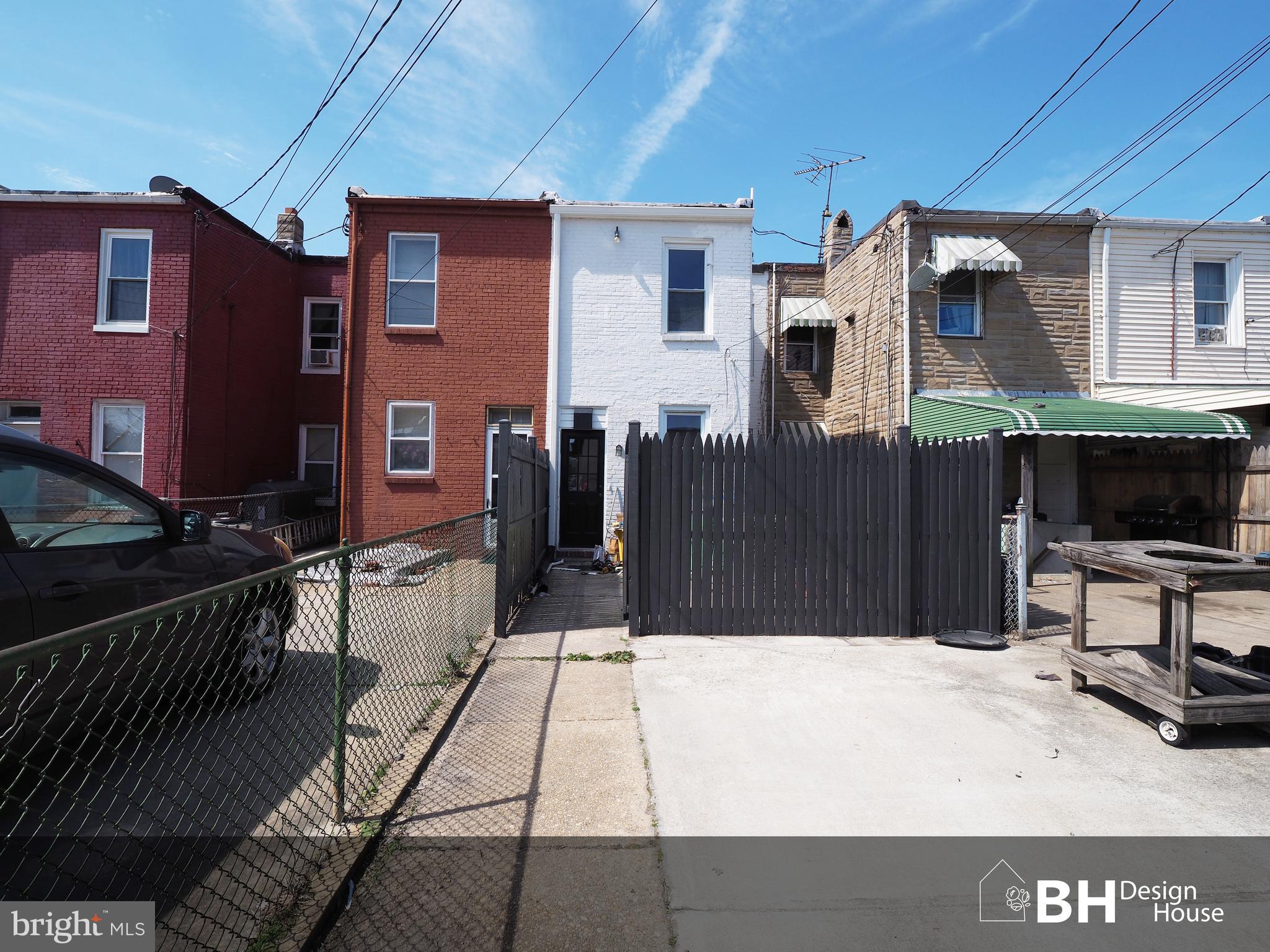 449 Anglesea Street Baltimore, MD 21224 - Photo 38 of 46 driveway leading from backyard