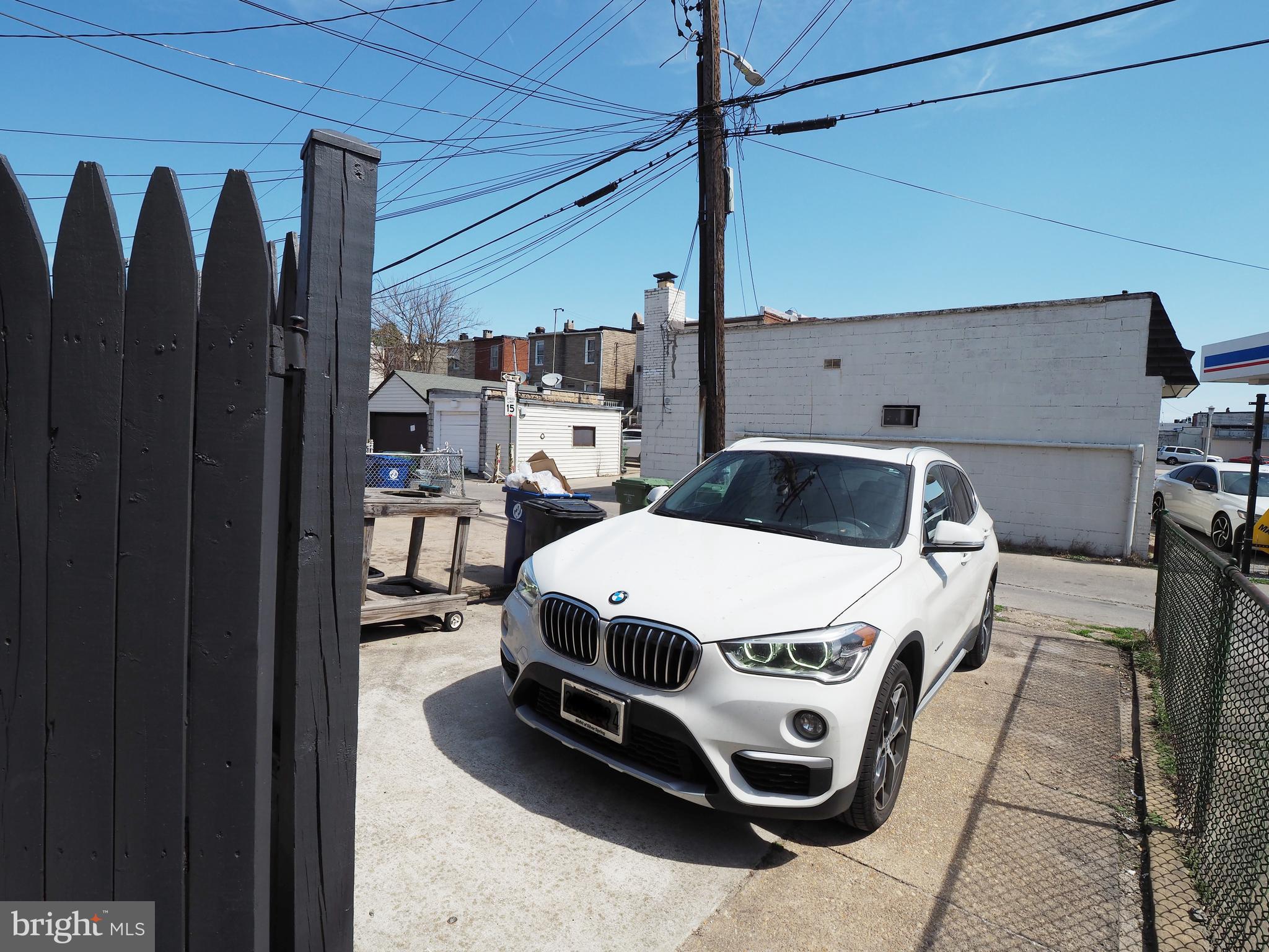 449 Anglesea Street Baltimore, MD 21224 - Photo 39 of 46 driveway leading from backyard