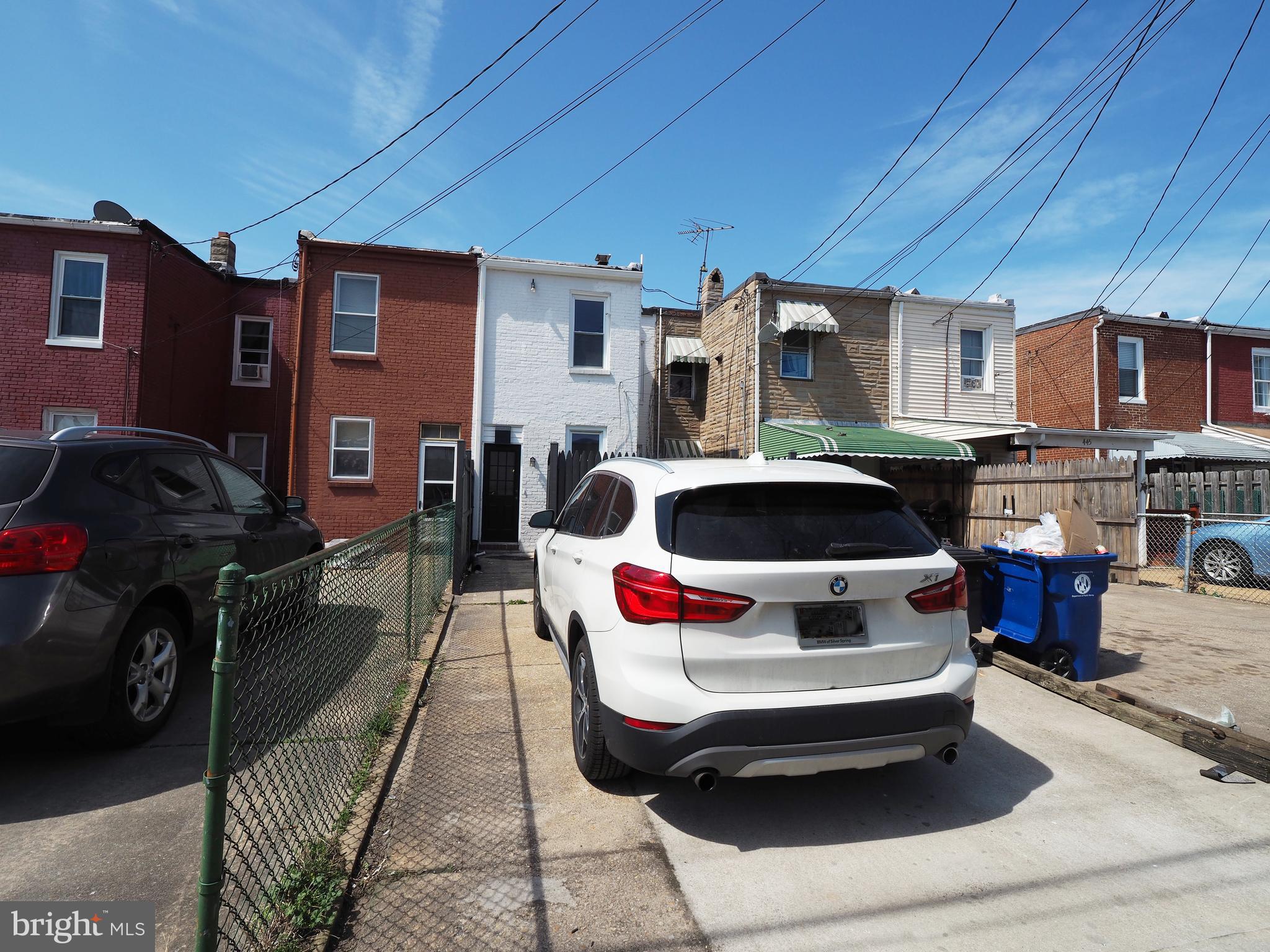 449 Anglesea Street Baltimore, MD 21224 - Photo 40 of 46 driveway leading from backyard