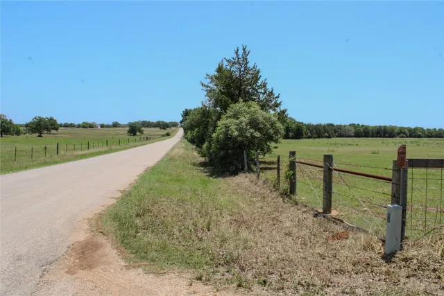 a view of a lake from a yard