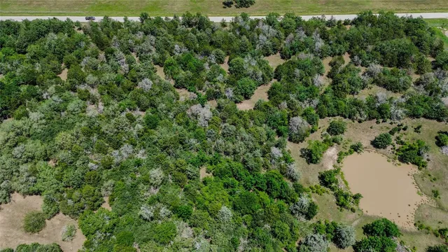 a view of a field with an outdoor space