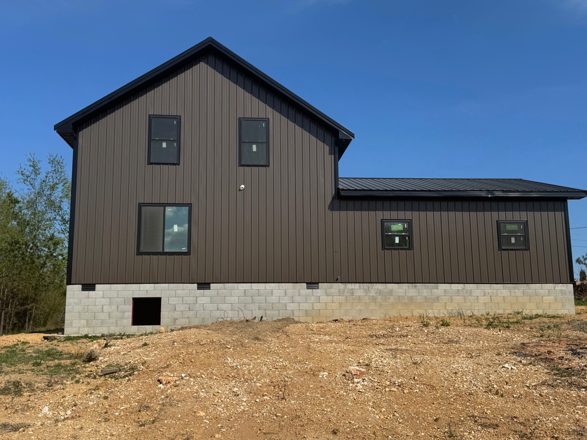 119 Pond View Lane Hohenwald, TN 38462 - Photo 5 of 9 a front view of a house with a yard