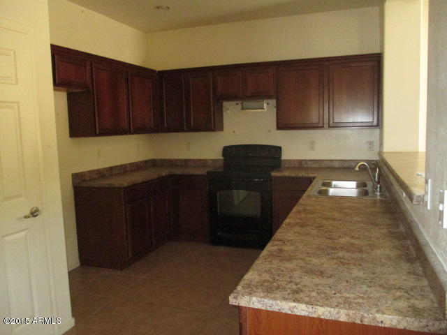 9922 West Bloch Road Tolleson, AZ 85353 - Photo 8 of 25 023-253802- kitchen 2