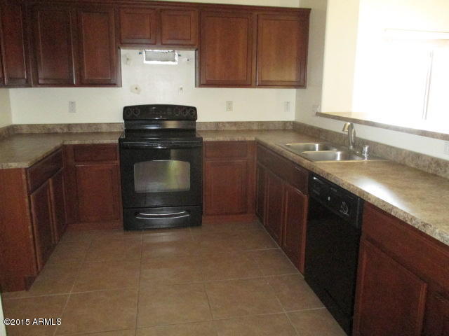 9922 West Bloch Road Tolleson, AZ 85353 - Photo 9 of 25 023-253802- kitchen