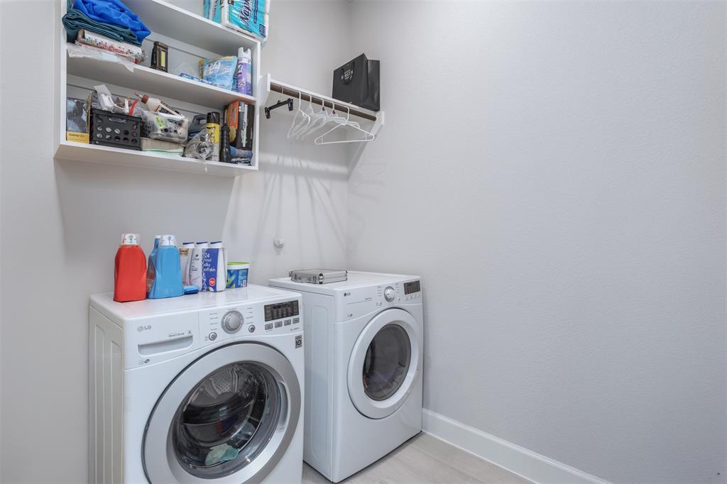 9110 Copperhead Road Little Elm, TX 75068 - Photo 23 of 35 a utility room with dryer and washer