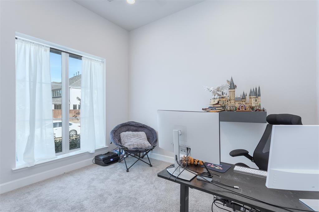 9110 Copperhead Road Little Elm, TX 75068 - Photo 4 of 35 a room with a table and chairs