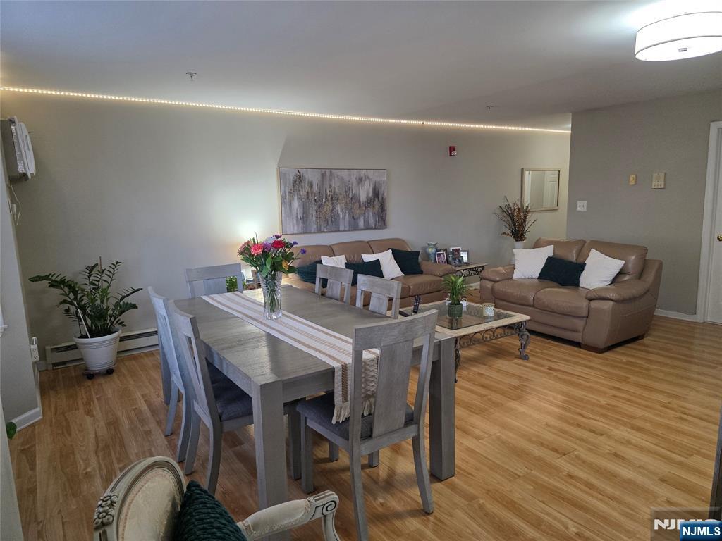 420 Passaic Street, Unit 2G Hackensack, NJ 07601 - Photo 12 of 35 a view of a livingroom with furniture and a potted plant