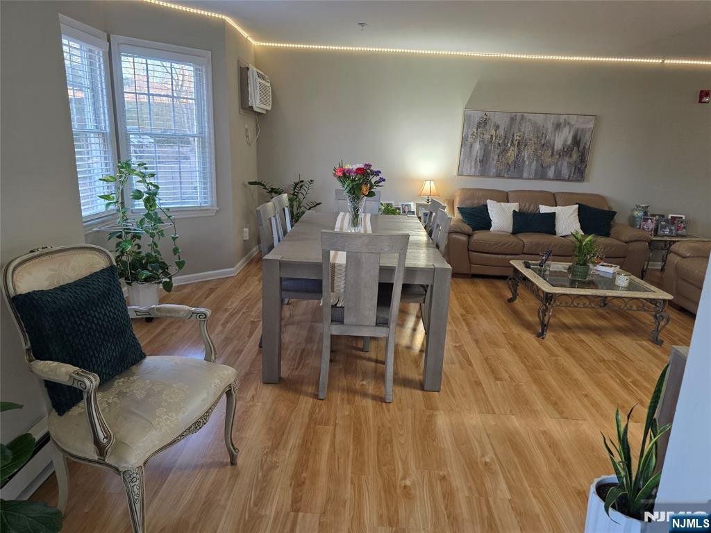 420 Passaic Street, Unit 2G Hackensack, NJ 07601 - Photo 14 of 35 a living room with furniture and a potted plant