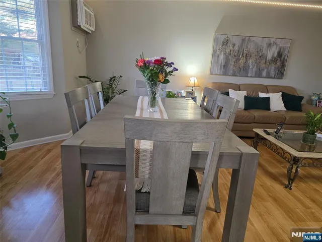 a bedroom with bed and window