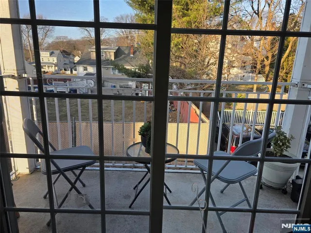 a bathroom with a shower curtain and a sink
