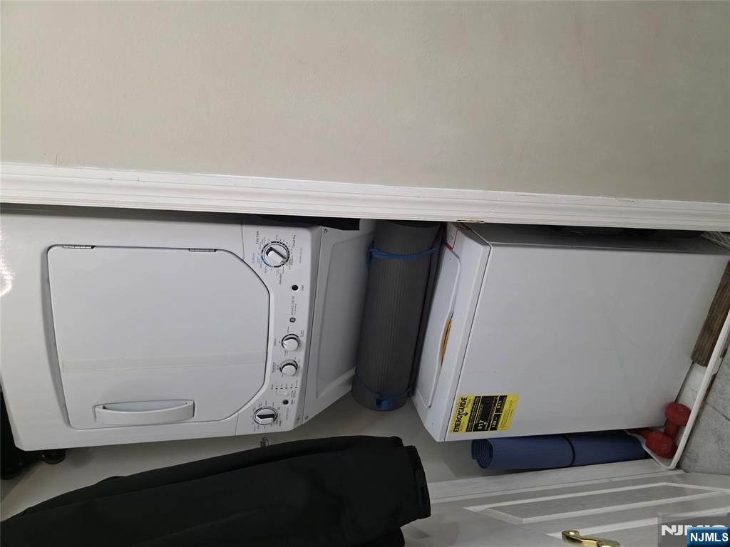 420 Passaic Street, Unit 2G Hackensack, NJ 07601 - Photo 34 of 35 a utility room with dryer and washer