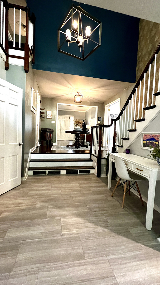 644 Genesee Avenue Morrison, IL 61270 - Photo 16 of 52 a view of a room with lots of wooden furniture and stairs