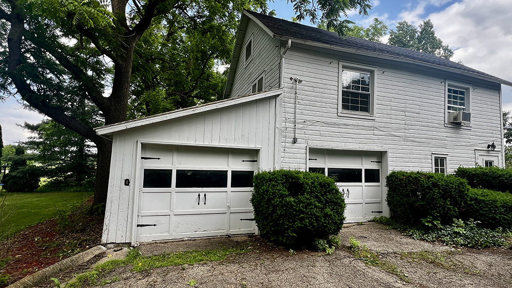 644 Genesee Avenue Morrison, IL 61270 - Photo 35 of 52 a view of house with backyard space and garden