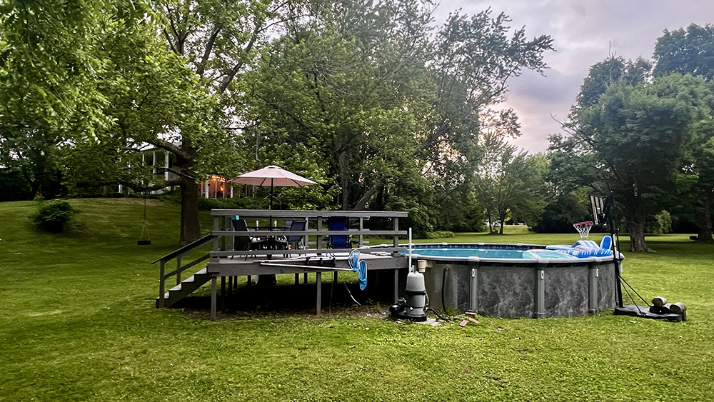 644 Genesee Avenue Morrison, IL 61270 - Photo 42 of 52 a view of a wooden deck and a yard