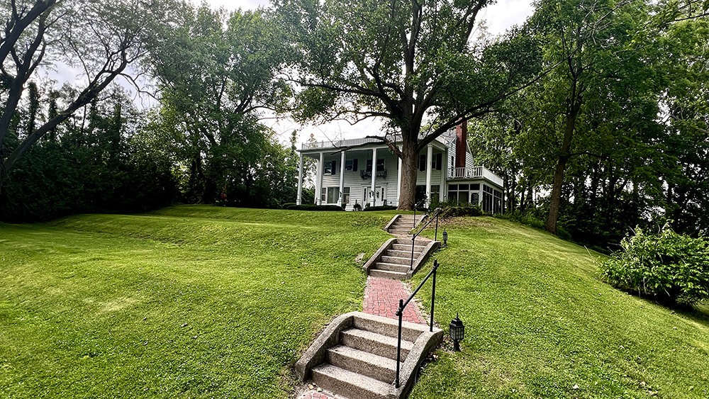 644 Genesee Avenue Morrison, IL 61270 - Photo 6 of 52 a view of a backyard with a small cabin