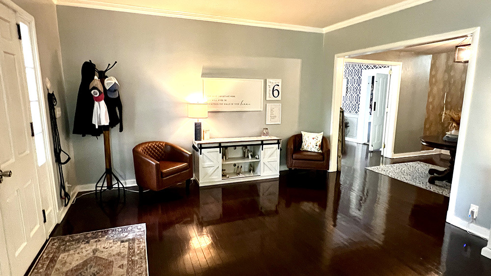 644 Genesee Avenue Morrison, IL 61270 - Photo 8 of 52 a living room with furniture and a window