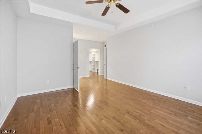 89 Ridgeview Lane, Unit 89 Mount Arlington, NJ 07856 - Photo 21 of 43 wooden floor in an empty room