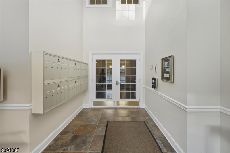 89 Ridgeview Lane, Unit 89 Mount Arlington, NJ 07856 - Photo 35 of 43 a view of empty room with windows