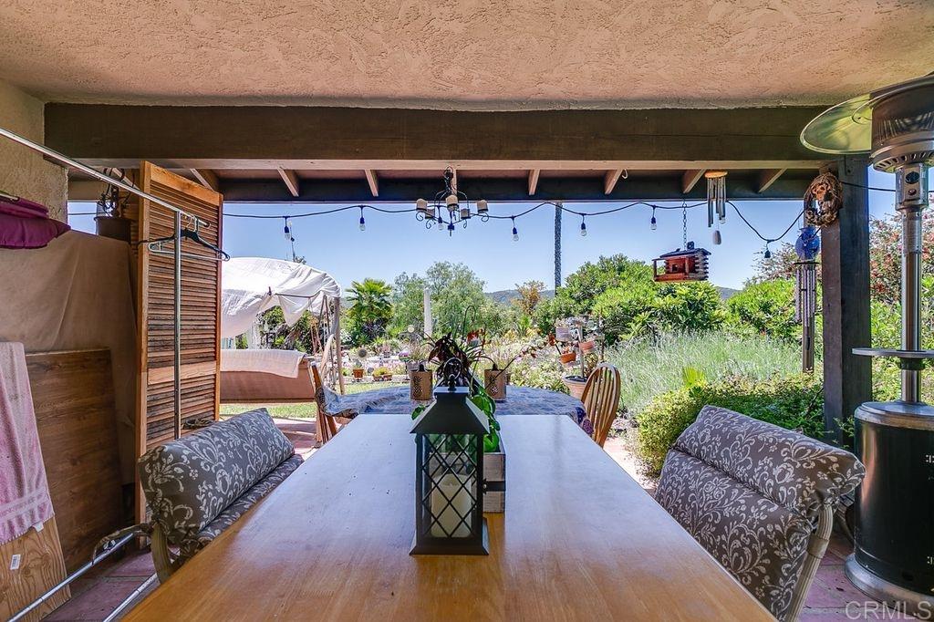 14705 Vesper Road Valley Center, CA 92082 - Photo 16 of 25 Covered patio off of Family room has nice view of mountains and pool area