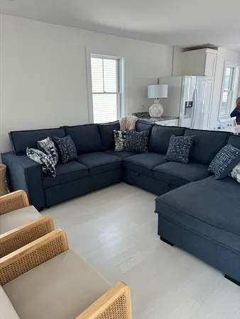 a living room with furniture and a couch