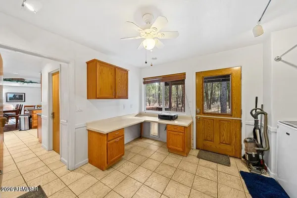 a kitchen with a sink a stove and refrigerator