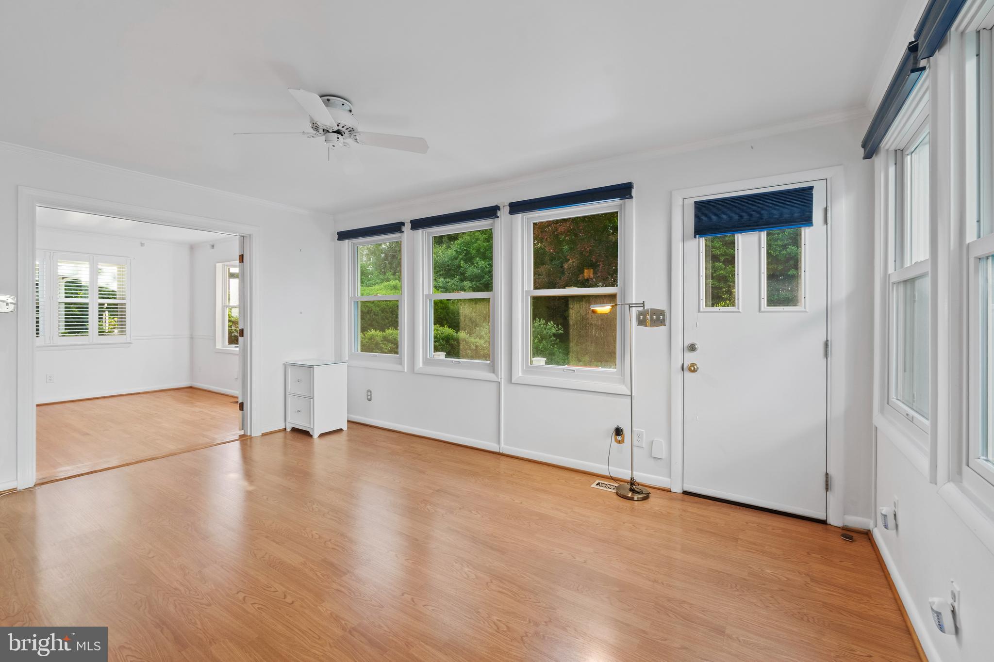 530 Anneslie Road Baltimore, MD 21212 - Photo 12 of 38 a view of an empty room with a window and wooden floor