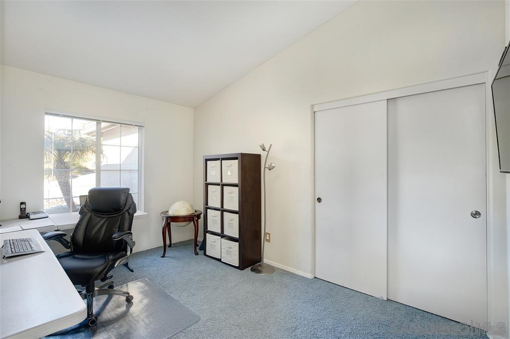 2673 Lobelia Road Alpine, CA 91901 - Photo 14 of 15 a livingroom with workspace and a window