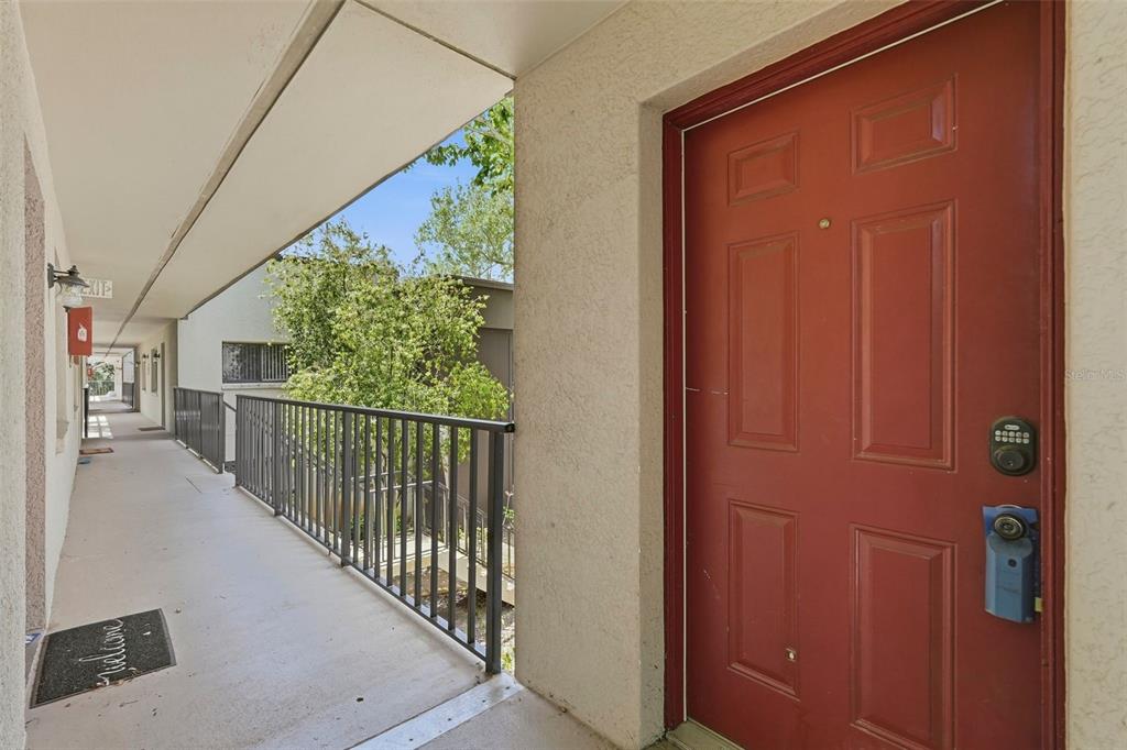 11709 Raintree Village Boulevard, Unit C Temple Terrace, FL 33617 - Photo 2 of 23 a view of a balcony