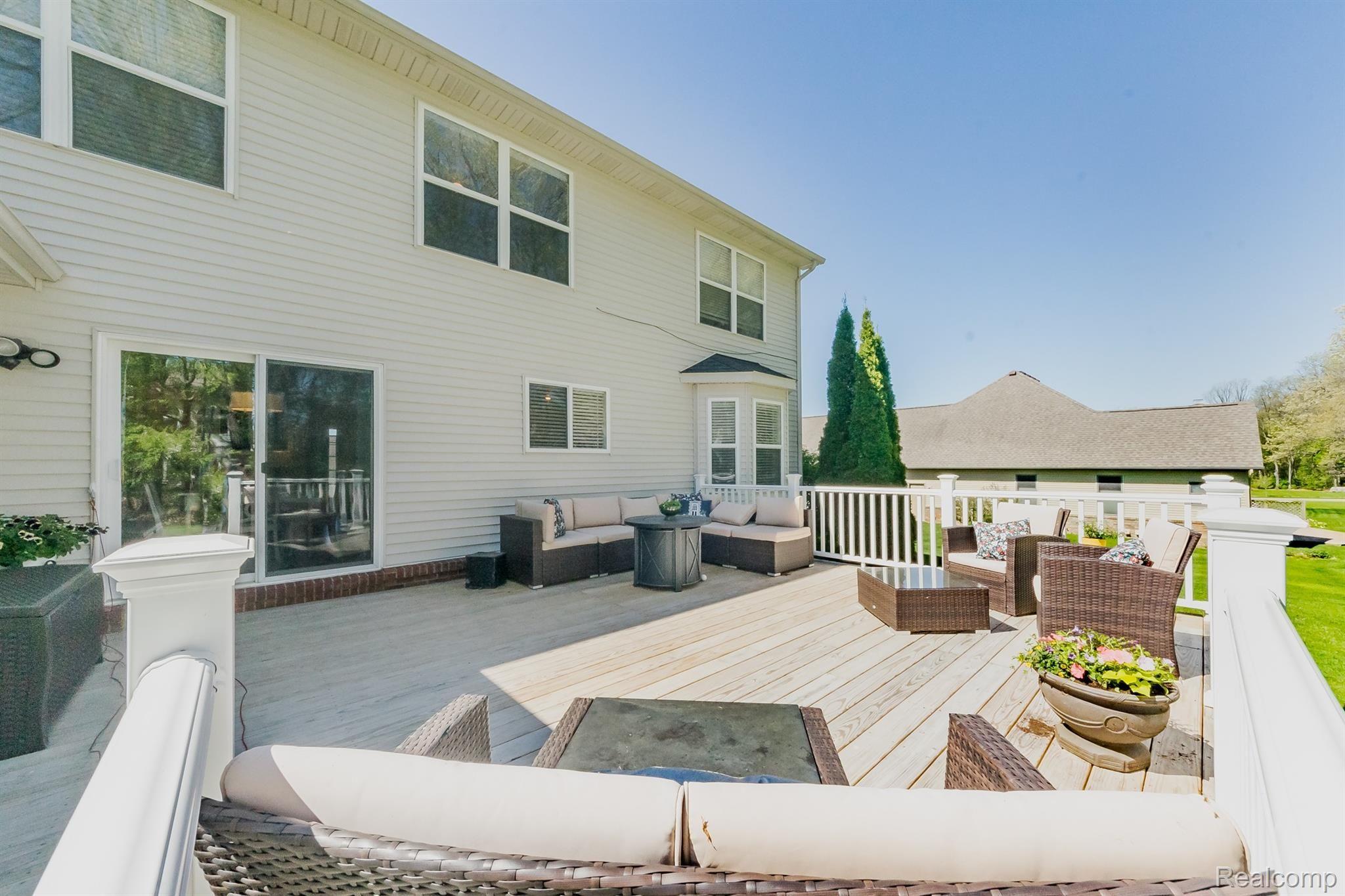 9855 Viewcrest Court Howell, MI 48843 - Photo 26 of 30 Expansive deck