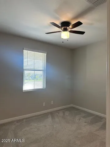 a bathroom with a shower and a toilet