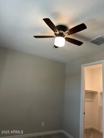 a bathroom with a double vanity sink and mirror