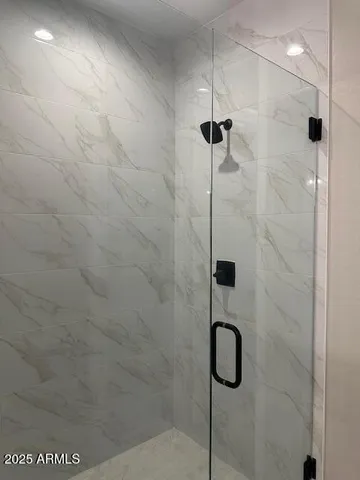 a view of a room with racks on the wall