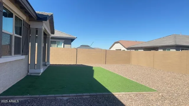 a large kitchen with cabinets and stainless steel appliances