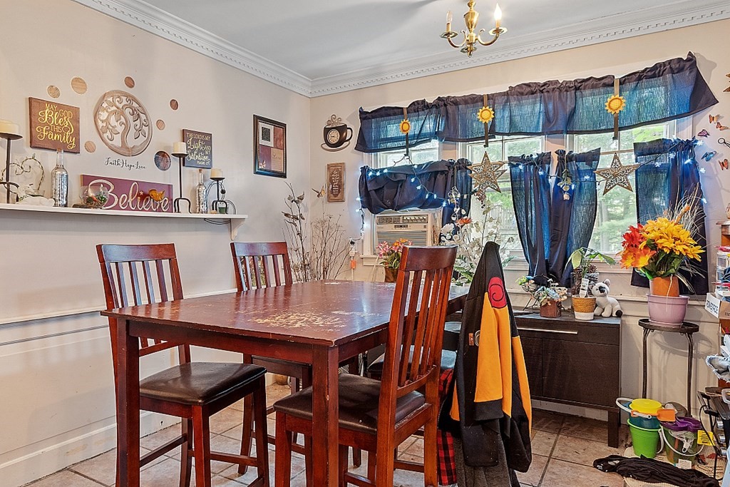 55 Sylvan Road Lancaster, MA 01523 - Photo 11 of 22 a view of a dining room with furniture