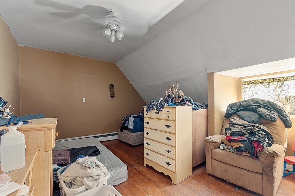 55 Sylvan Road Lancaster, MA 01523 - Photo 22 of 22 a bedroom with storage and utility