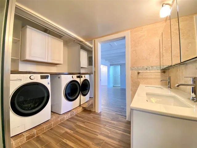 a kitchen with stainless steel appliances granite countertop a stove and a sink