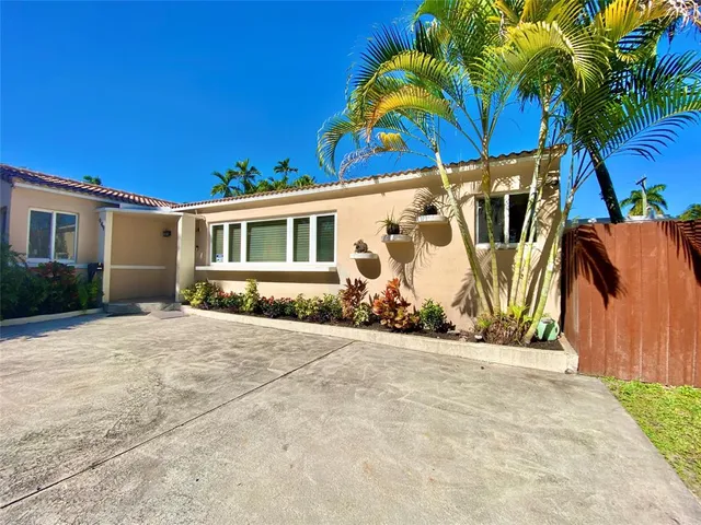 a view of a house with a patio