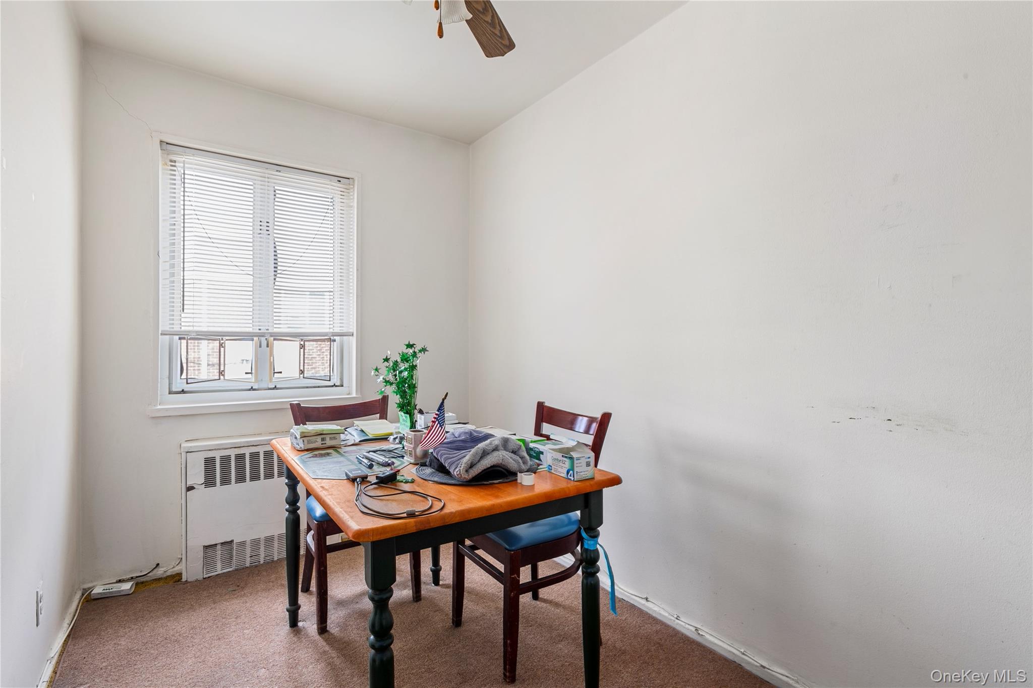 221-31 Braddock Avenue, Unit UPPR Queens, NY 11427 - Photo 11 of 16 a view of a dining room with furniture